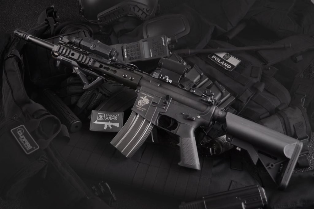 Detailed view of military rifles and tactical equipment, showcasing precision.